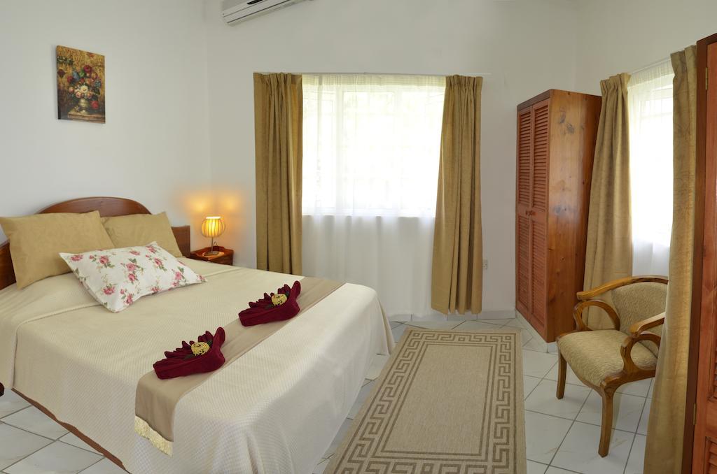 Ixora Villa Anse Royale Pokoj fotografie