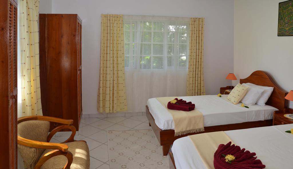 Ixora Villa Anse Royale Pokoj fotografie